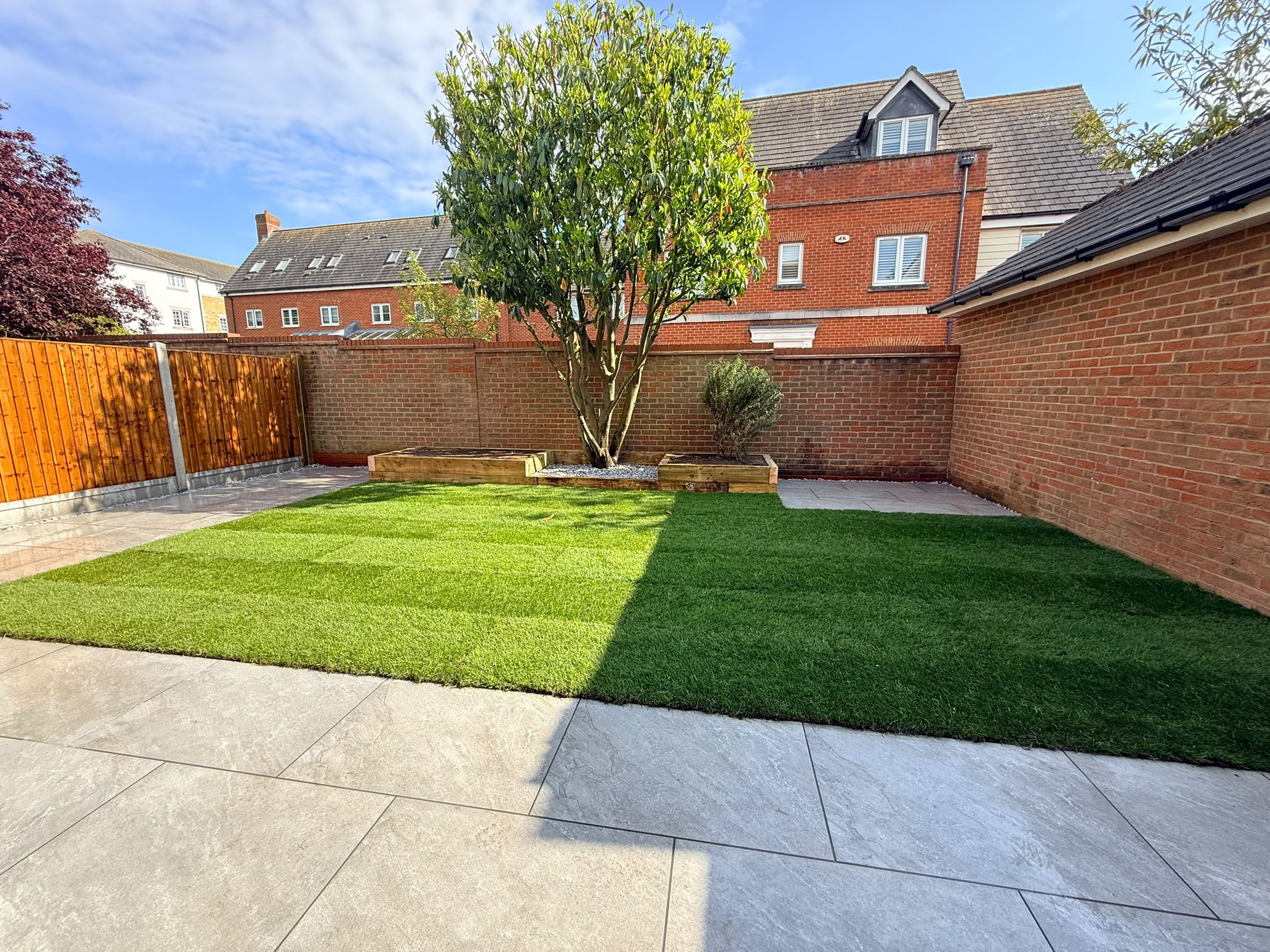Modern garden with feature tree and raised planters on Purcell Road, Witham
