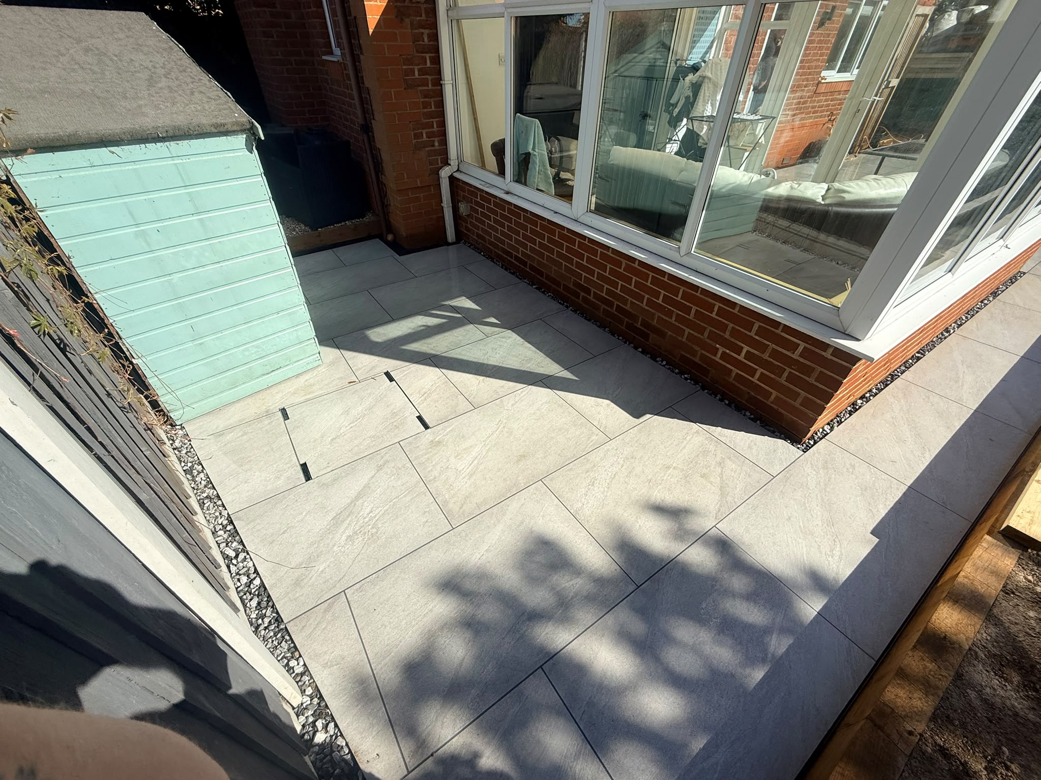Porcelain paving beside the conservatory in Chelmsford